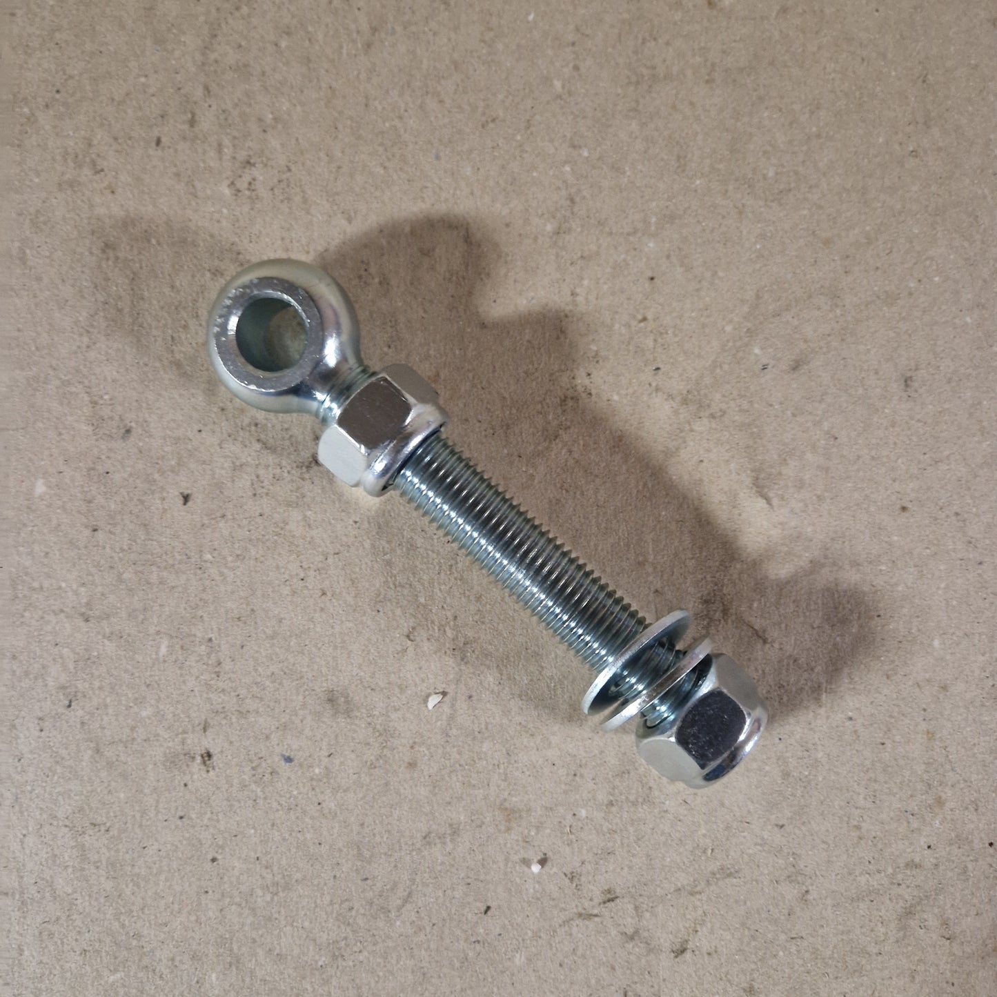 Hinge point bolt for tailgate